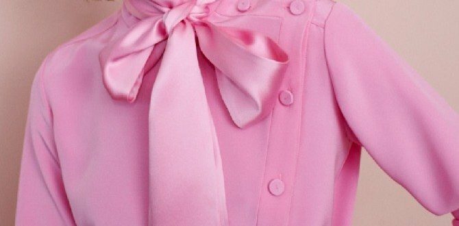 bluza-s-bantom-i-dekorativnoy-bokovoy-zastezhkoy